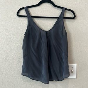 100%silk lightweight tank. Amazing color, zip up back.